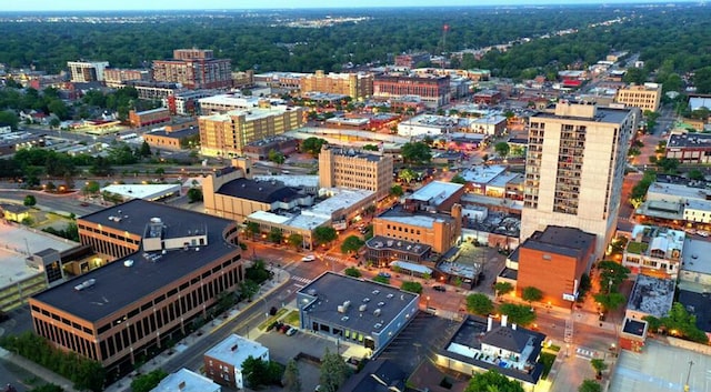 birds eye view of property with a view of city