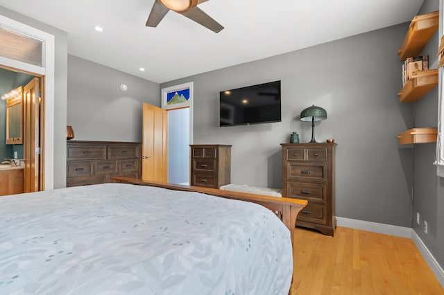 bedroom featuring light wood finished floors, recessed lighting, ceiling fan, and baseboards