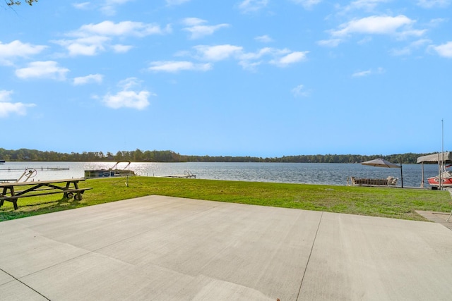 view of patio featuring a water view