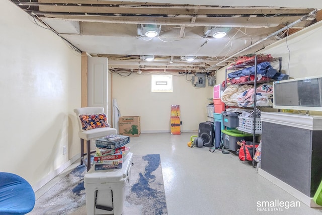 basement featuring baseboards