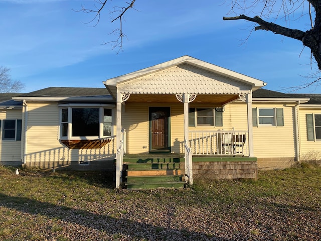 view of front of home featuring covered porch