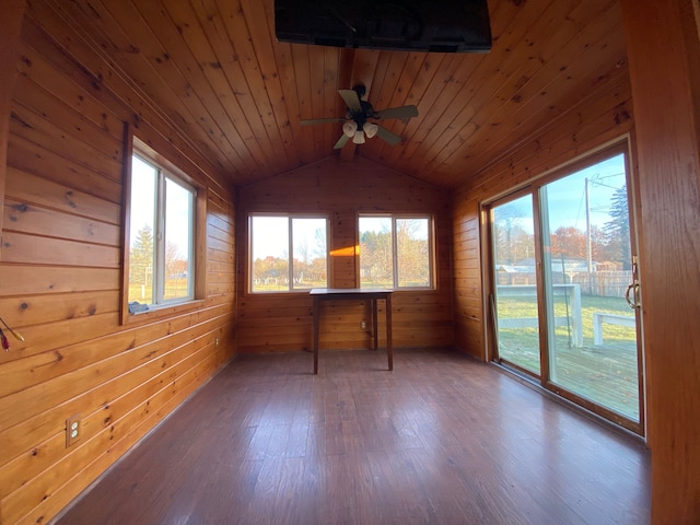 unfurnished sunroom featuring lofted ceiling, wood ceiling, and ceiling fan