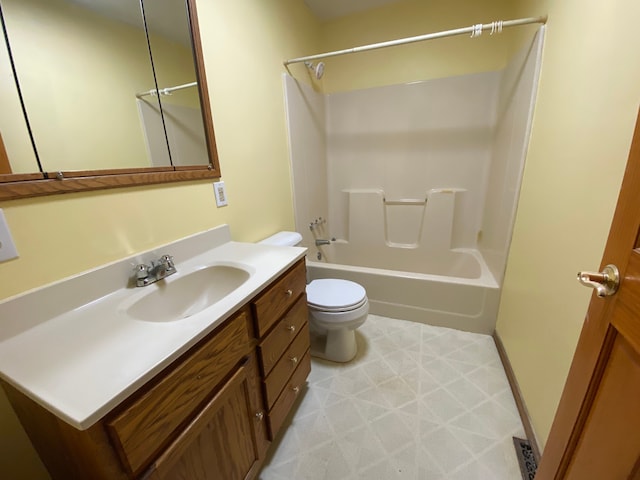 full bathroom with toilet, vanity, and bathtub / shower combination