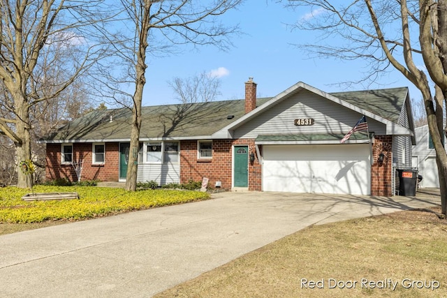 ranch-style home featuring an attached garage, brick siding, driveway, and a chimney