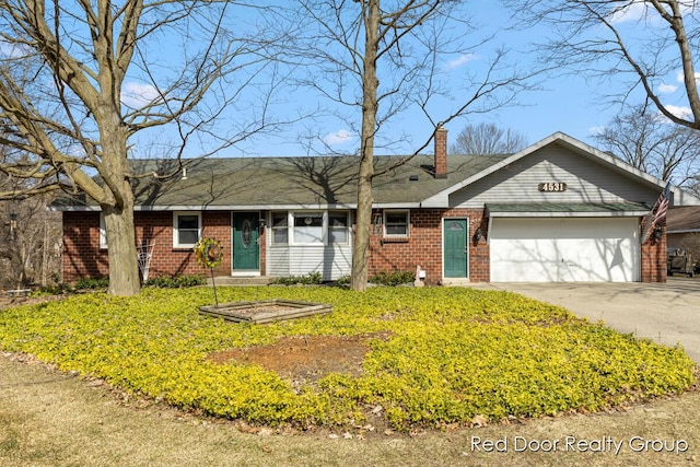 single story home with brick siding, an attached garage, a chimney, and driveway