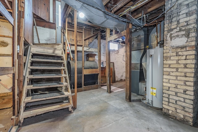 basement featuring heating fuel and water heater