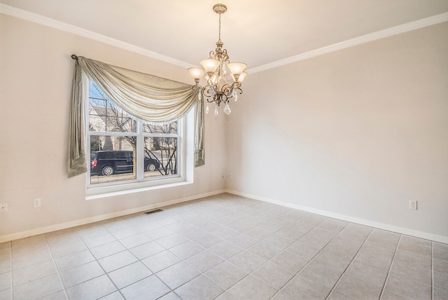 empty room with a chandelier, crown molding, and baseboards