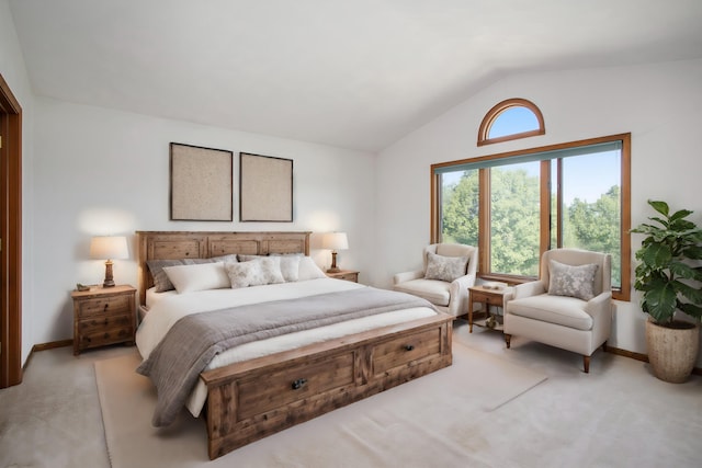 bedroom with baseboards, light colored carpet, and vaulted ceiling