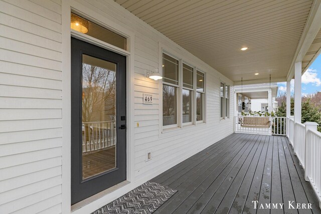 wooden deck with covered porch