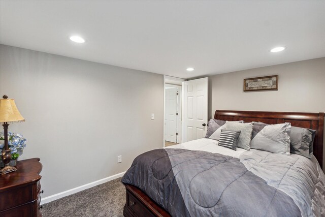 carpeted bedroom featuring recessed lighting and baseboards