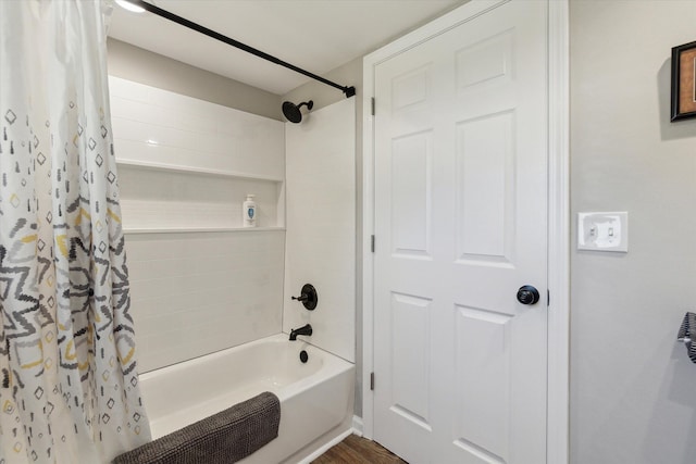 full bathroom featuring shower / bath combination with curtain