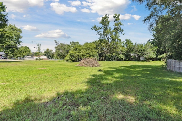 view of yard featuring fence