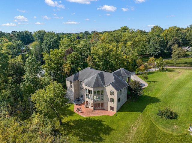 aerial view with a wooded view