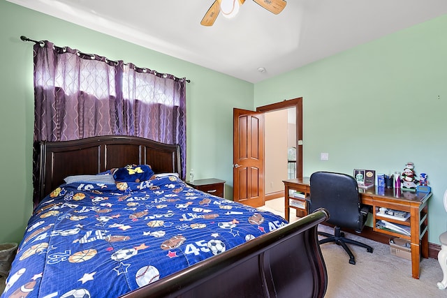 bedroom featuring light colored carpet and ceiling fan