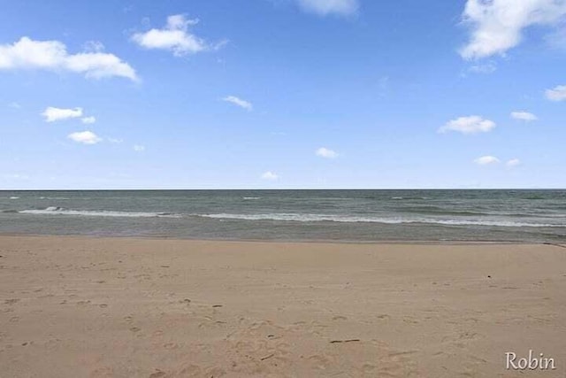 property view of water featuring a beach view