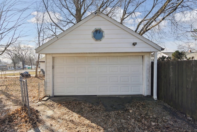 detached garage with fence