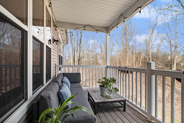 wooden deck featuring an outdoor living space