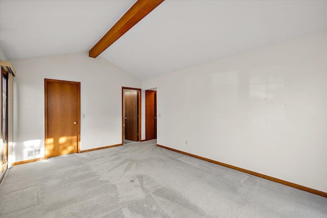 unfurnished bedroom featuring lofted ceiling with beams, visible vents, baseboards, and light carpet