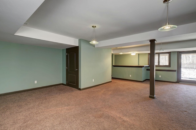 empty room with baseboards and carpet floors