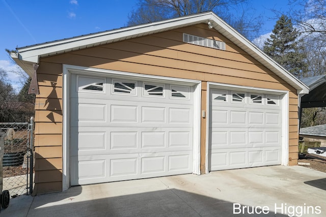 detached garage with fence