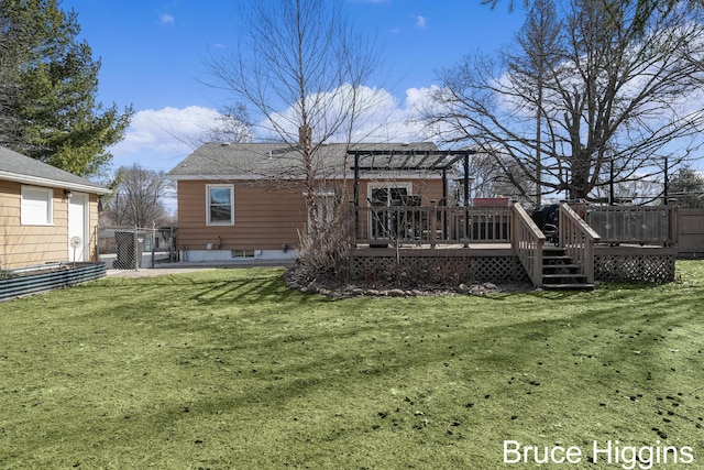 back of property featuring fence, a lawn, a deck, and a pergola