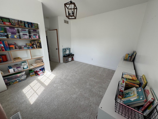 recreation room with visible vents, baseboards, an inviting chandelier, and carpet floors