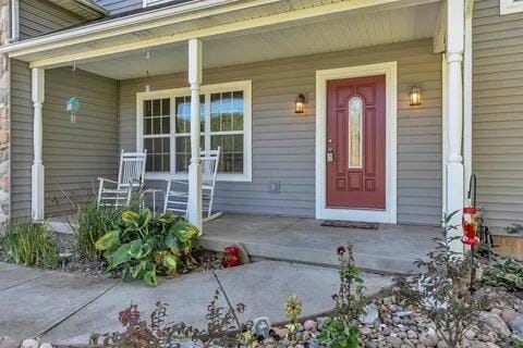 property entrance with a porch