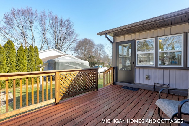 deck featuring a yard