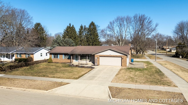 single story home with driveway, an attached garage, a chimney, a front lawn, and brick siding