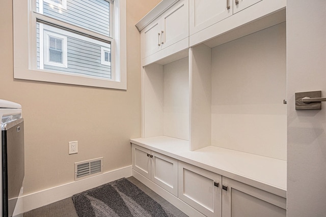 mudroom featuring visible vents and baseboards