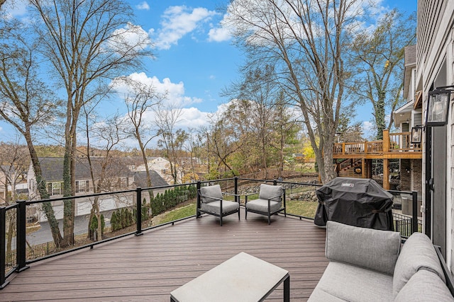 wooden deck with grilling area