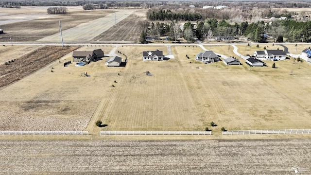 birds eye view of property featuring a rural view