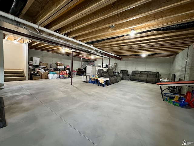 unfinished basement with stairway