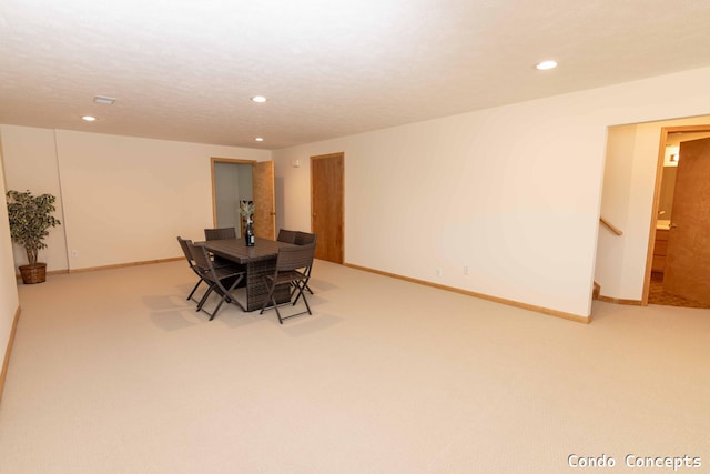 dining space with recessed lighting, baseboards, and carpet