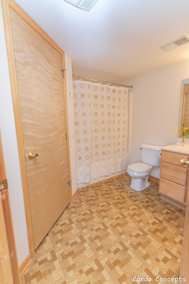 full bath featuring visible vents, toilet, and vanity