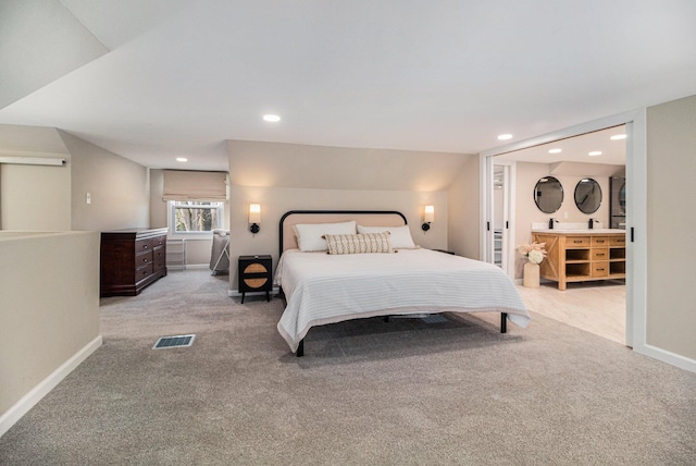 bedroom featuring visible vents, light carpet, recessed lighting, baseboards, and lofted ceiling