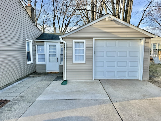 detached garage with driveway