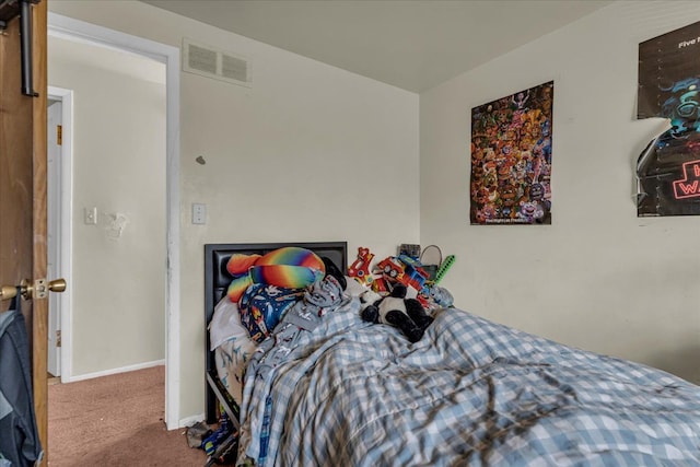 bedroom with visible vents, baseboards, and carpet floors