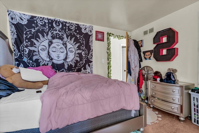 bedroom featuring visible vents and carpet flooring