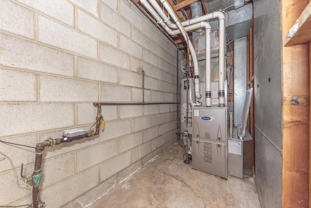 utility room with gas water heater