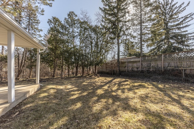 view of yard with fence