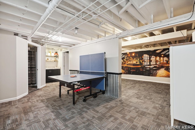 playroom featuring carpet flooring and baseboards