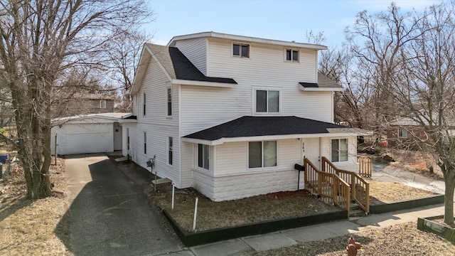 exterior space with a shingled roof