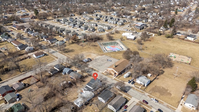 birds eye view of property with a residential view