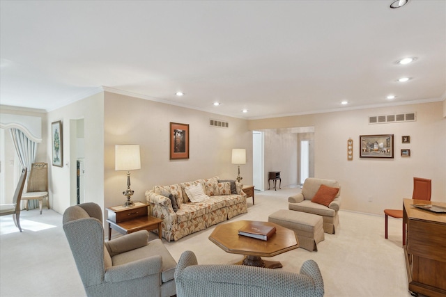 living room with recessed lighting, visible vents, and light colored carpet