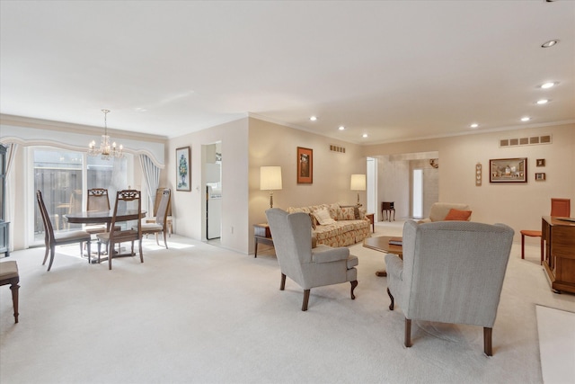 living room with light carpet, visible vents, and an inviting chandelier