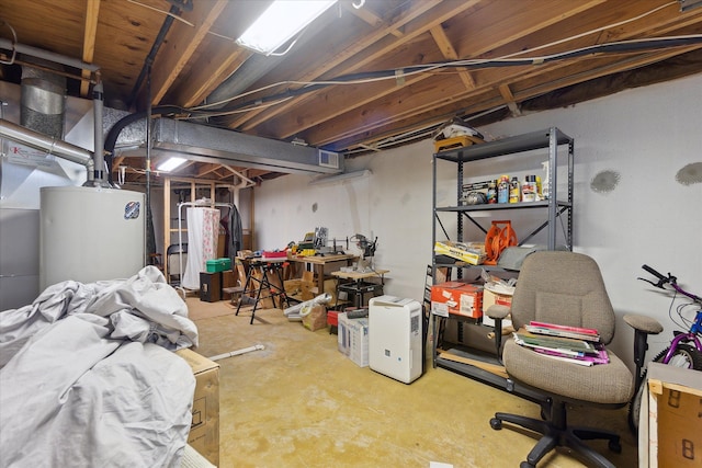 unfinished basement featuring visible vents and water heater