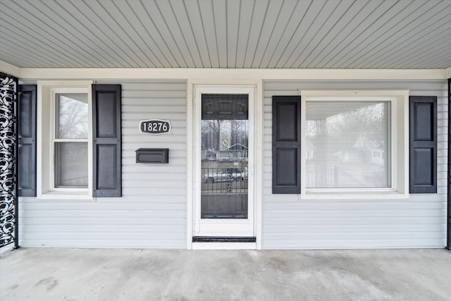 entrance to property with covered porch