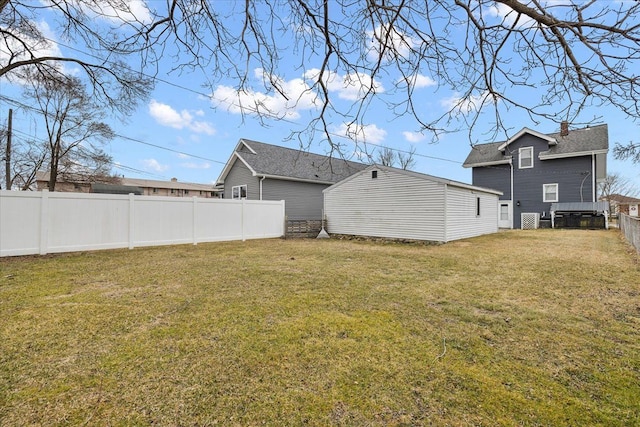 view of yard with a fenced backyard