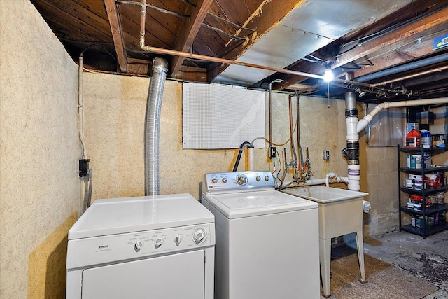 laundry room featuring laundry area and washing machine and clothes dryer